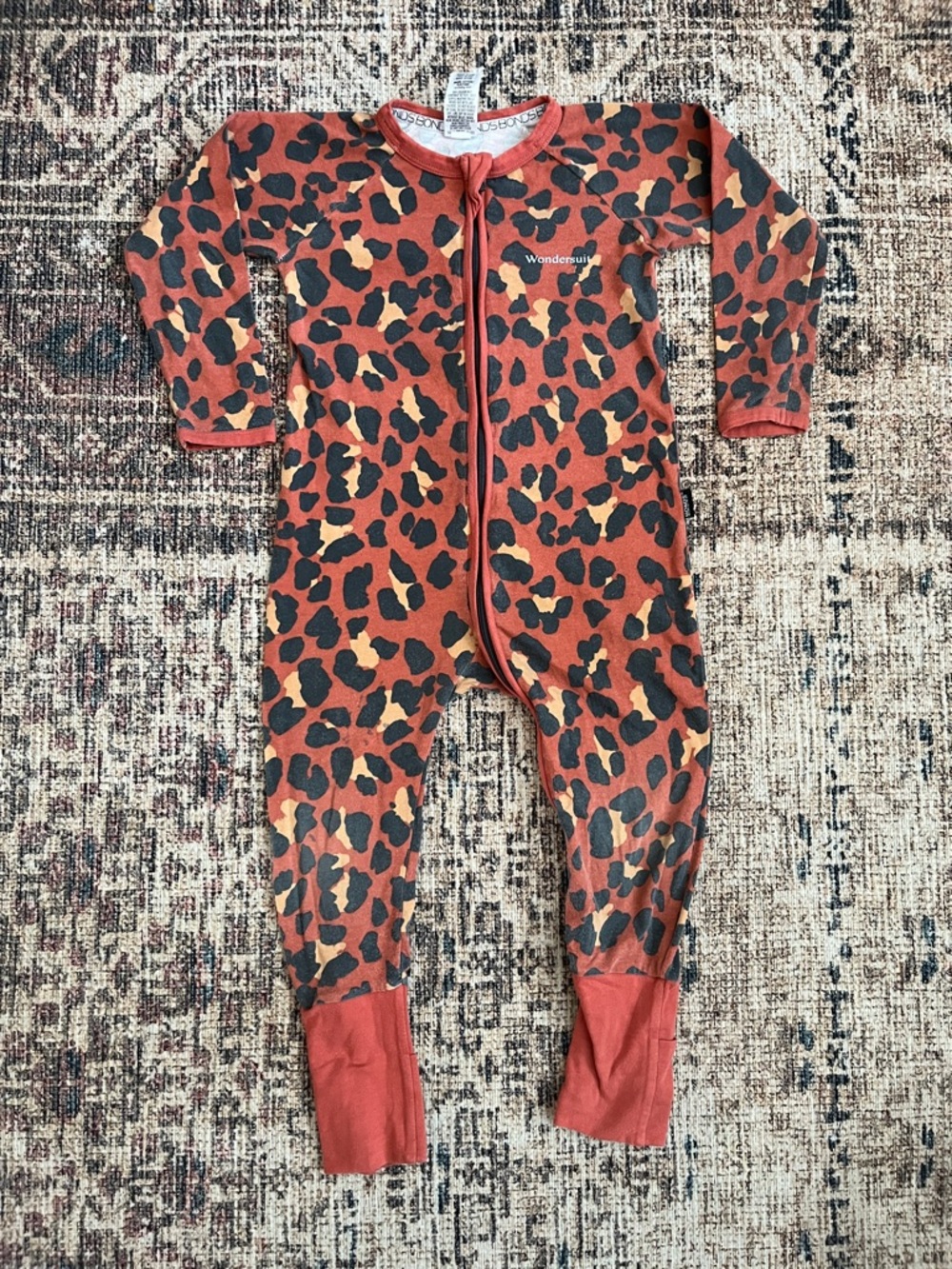 Bonds PLAY Wondersuit Rust and Black Leopard Print Footed One-Piece